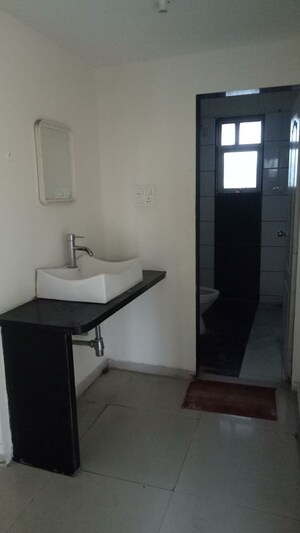 Bathroom in 2 BHK Apartment at Mind Space Queenstown, Chinchwad – for Rent