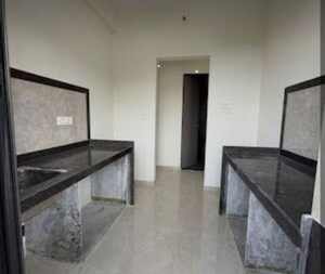 Kitchen/pantry in 1 BHK Apartment at Damji Shamji Mahavir Spring Tulip Phase 1, Pokhran Road No Two – for Sale