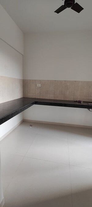 Kitchen in 2 BHK Apartment at Shapoorji Pallonji Sensorium, Hinjewadi – for Rent