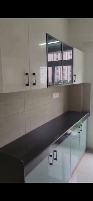 Kitchen in 3 BHK Apartment at Godrej Emerald, Ghodbunder Road – for Rent