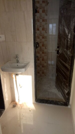 Bathroom in 1 BHK Apartment at Renuka Gloria, Ravet – for Rent