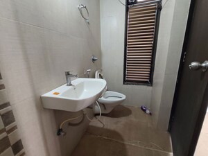 Bathroom in 3 BHK Apartment at Galaxy Carina, Kharghar – for Rent