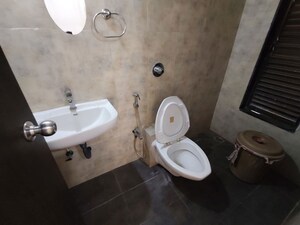 Bathroom in 3 BHK Apartment at Galaxy Carina, Kharghar – for Rent