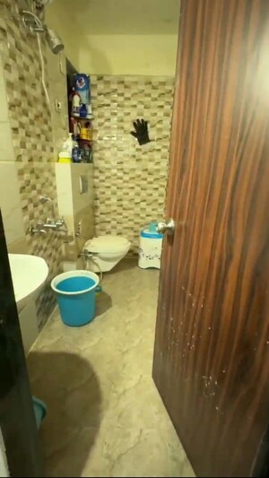 Bathroom in 2 BHK Apartment at Man Opus, Mira Road – for Sale