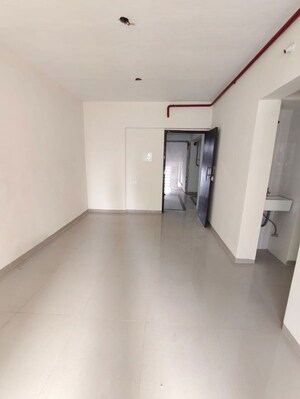 Living Room in 1 BHK Apartment at Purshottam Nayan, Ghodbunder Road – for Rent