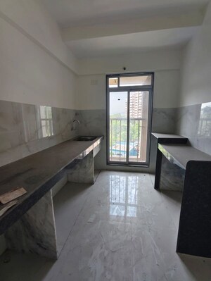 Kitchen in 1 BHK Apartment at Metropolis Bayside, Kasarvadavali – for Rent