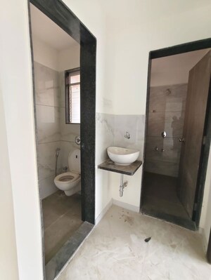 Bathroom in 1 BHK Apartment at Metropolis Bayside, Kasarvadavali – for Rent