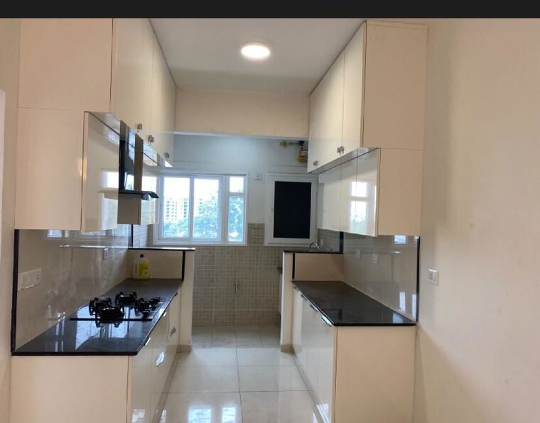 Kitchen, l-t-raintree-boulevard 3 Bedroom 1134 Sq.Ft. Apartment In Hebbal Bangalore 10756087