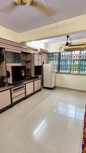 Living Room in 1.5 BHK Apartment at Suchita CHS, Santacruz East – for Rent