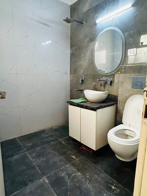 Bathroom in 4 BHK Builder Floor at Green Fields Colony – for Rent