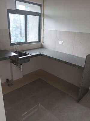 Kitchen in 1 BHK Apartment at Piramal Vaikunth, Balkum Pada – for Rent