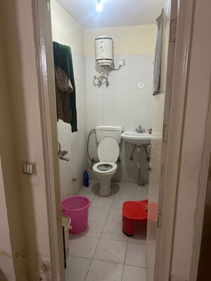 Bathroom in 3 BHK Apartment at Adore Happy Homes Grand, Sector 85 – for Sale