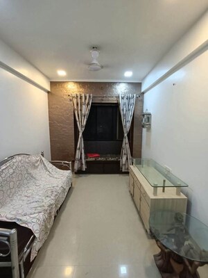 Living Room in 1 BHK Apartment at Marine Chambers, Marine Lines – for Rent