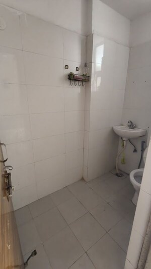 Bathroom in 2 BHK Apartment at Adore Happy Homes, Sector 86 – for Sale
