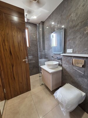 Bathroom in 3 BHK Builder Floor at Amolik Aster Woods, Sector 98 – for Sale