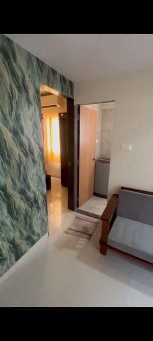 Living Room in 2 BHK Apartment at Andheri CHS, Andheri West – for Rent