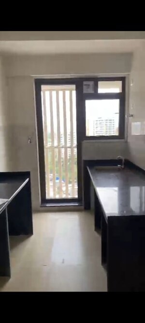 Kitchen in 2 BHK Apartment at Andheri CHS, Andheri West – for Rent