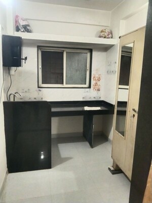 Kitchen in 1 BHK Apartment at Shri Senapati Bapat CHS, Senapati Bapat Road – for Rent