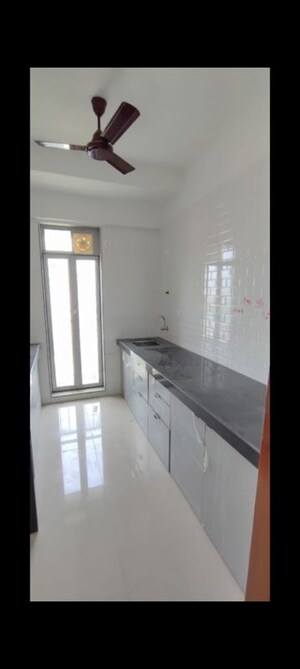 Kitchen in 2 BHK Apartment at Mayfair Virar Gardens, Bolinj – for Rent