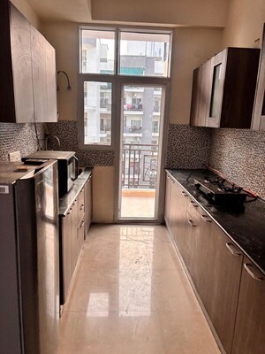 Kitchen in 3 BHK Apartment at JM Aroma, Sector 75 – for Rent