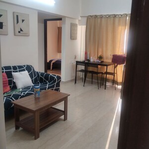 Living Room in 1 BHK Apartment at Omkar Signet, Malad East – for Rent