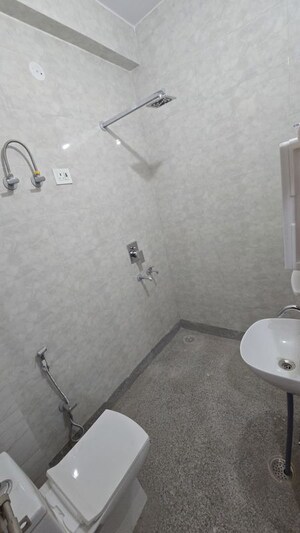 Bathroom in 2 BHK Apartment at Mahavir Enclave 3 – for Rent
