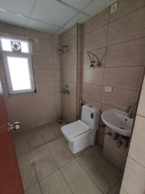 Bathroom in 3 BHK Apartment at Samridhi Luxuriya Avenue, Sector 150 – for Rent