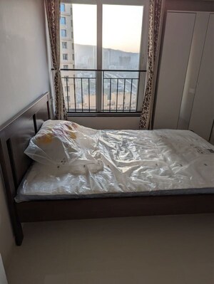 Bedroom in 2 BHK Apartment at Rustomjee Urbania Azziano, Thane West – for Rent