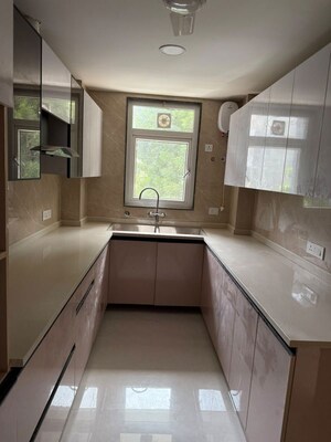 Kitchen in 3 BHK Apartment at Smart World Orchard, Sector 61 – for Sale