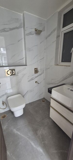 Bathroom in 3 BHK Apartment at Smart World Orchard, Sector 61 – for Sale