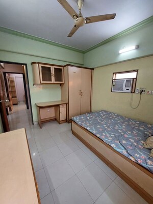 Bedroom in 4 BHK Apartment at Shagoofa CHS, Nerul – for Rent