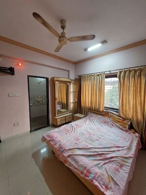 Bedroom in 4 BHK Apartment at Shagoofa CHS, Nerul – for Rent