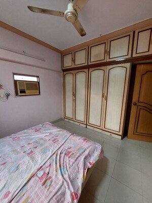 Bedroom in 4 BHK Apartment at Shagoofa CHS, Nerul – for Rent