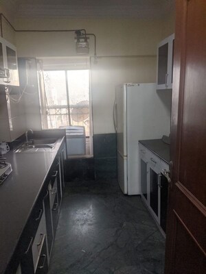 Kitchen in 2 BHK Apartment at Vanamali CHS, Chembur – for Rent