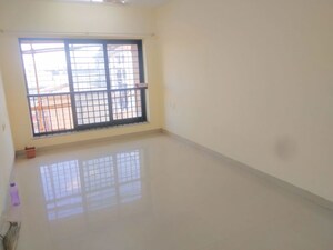 Living Room in 2 BHK Apartment at K Raheja Palm Spring, Malad West – for Rent