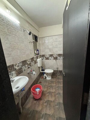 Bathroom in 2 BHK Apartment at Neeti Heritage, Nande – for Rent