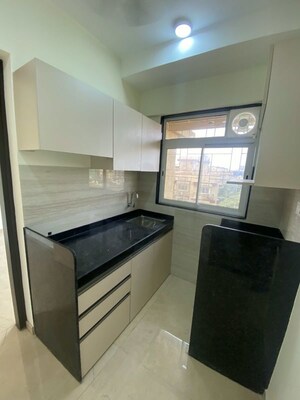 Kitchen in 1 BHK Apartment at Mahindra Vicino, Andheri East – for Rent