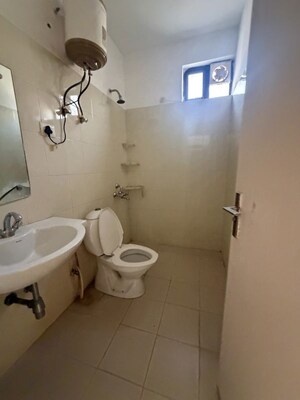 Bathroom in 2 BHK Builder Floor at Vatika India Next, Sector 82 – for Rent
