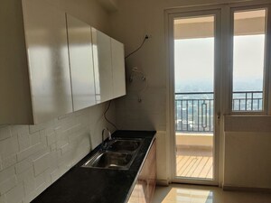 Kitchen in 4 BHK Apartment at Noble Callista, Sector 66 B – for Rent