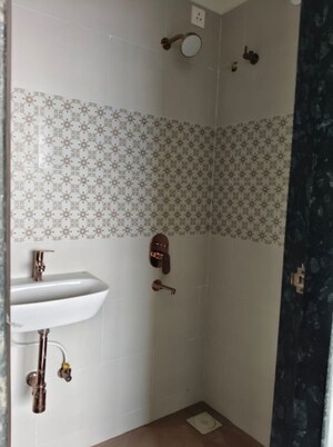 Bathroom in 1 BHK Apartment at MPCHFLS Galaxy Heights, Malad West – for Rent
