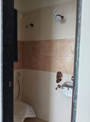 Bathroom in 1 BHK Apartment at MPCHFLS Galaxy Heights, Malad West – for Rent