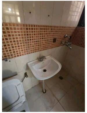 Bathroom in 2 BHK Apartment at Emenox Brave Hearts, Raj Nagar Extension – for Sale