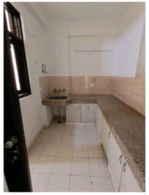Kitchen in 2 BHK Apartment at Emenox Brave Hearts, Raj Nagar Extension – for Sale