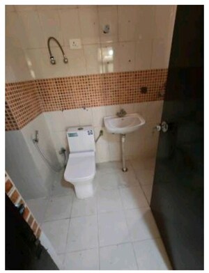 Bathroom in 2 BHK Apartment at Emenox Brave Hearts, Raj Nagar Extension – for Sale