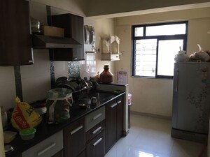 Kitchen in 1 BHK Apartment at Puranik City, Kasarvadavali – for Rent