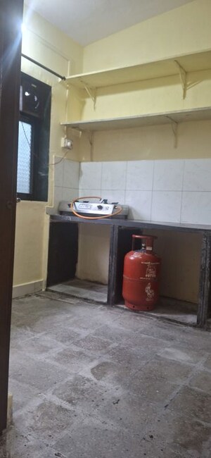 Kitchen in 1 RK Apartment at Gharonda Housing, Ghansoli – for Rent