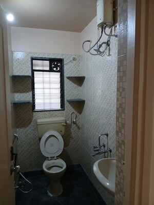 Bathroom in 2 BHK Apartment at Chandan Garden, Nibm Road – for Rent