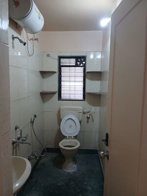 Bathroom in 2 BHK Apartment at Chandan Garden, Nibm Road – for Rent