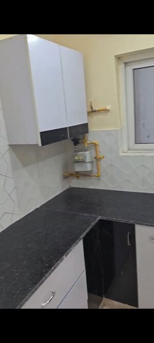 Kitchen in 3 BHK Apartment at Ansal Crown Heights, Sector 80 – for Rent