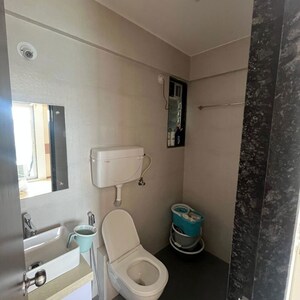 Bathroom in 2 BHK Apartment at Mahavir Kalpavruksha, Ghodbunder Road – for Rent